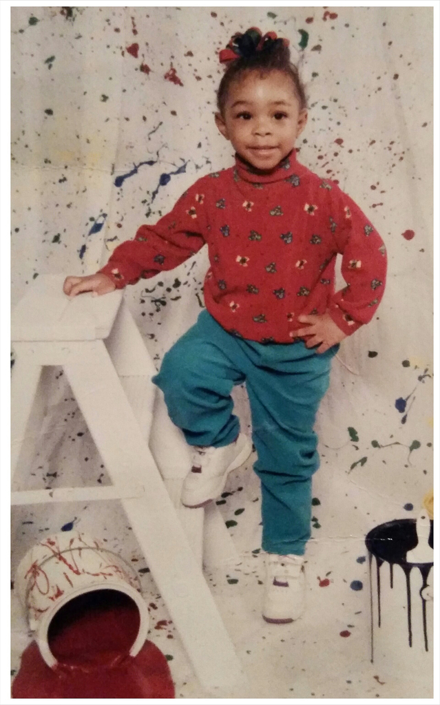 A childhood school portrait of a McCalla Elementary teacher or staff member, shared as part of a fun Picture Day guessing game for families.