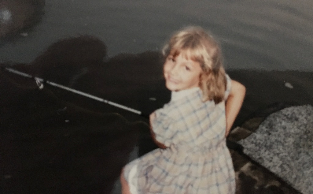 A childhood school portrait of a McCalla Elementary teacher or staff member, shared as part of a fun Picture Day guessing game for families.