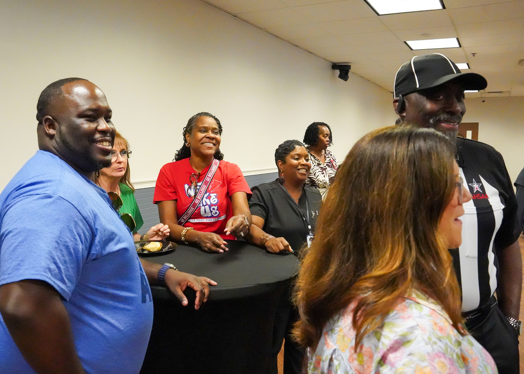 A group photo of attendees celebrating during Mr. Bobby Jackson's retirement party.