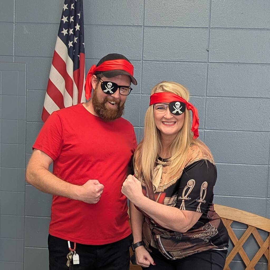 Two adults dressed up like pirates for Pirate Day
