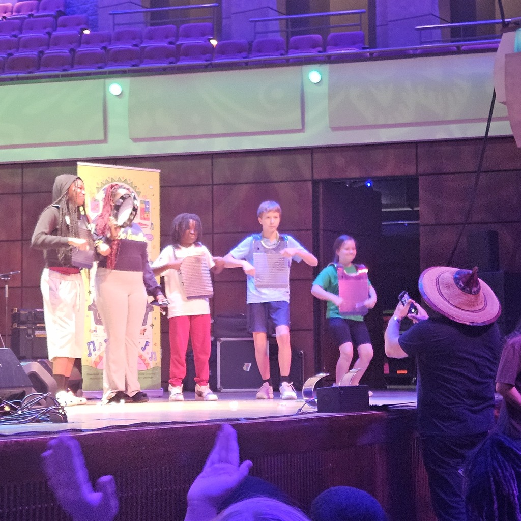 Students from different schools got to play frottoirs & tambourine on stage. 