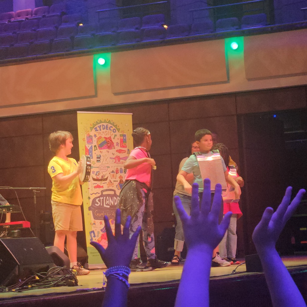 Students from different schools got to play frottoirs & tambourine on stage. 