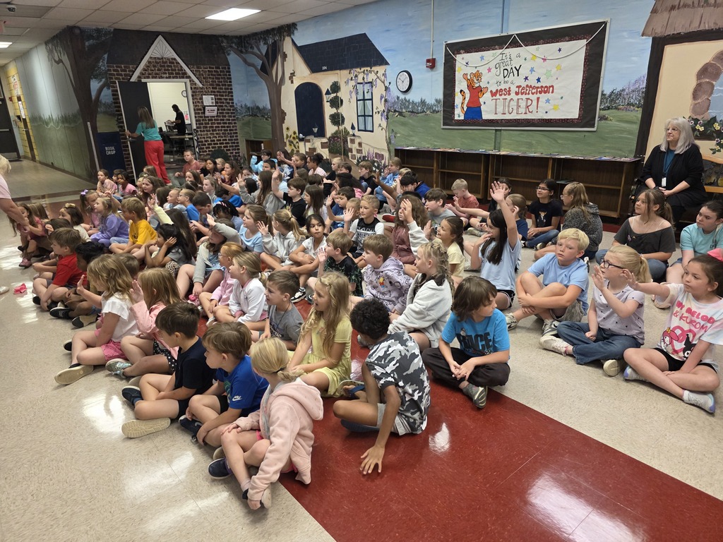 students sitting on the floor