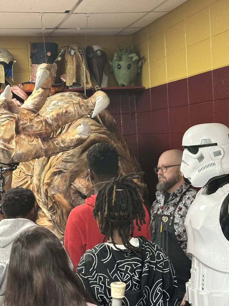 Pinson Valley High School's Special Effects teacher shows students a prop in his classroom made by a former student.