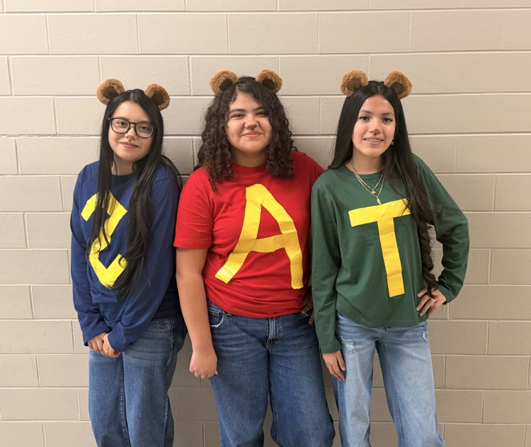 Three HMS students pose in matching Alvin and the Chipmunks-inspired outfits for Two to Tango Day.