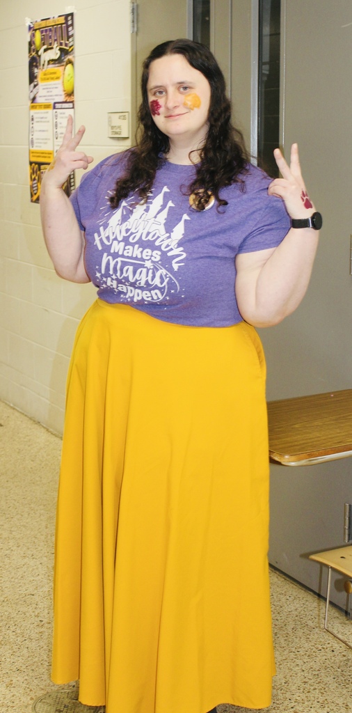 HMS staff member shows Panther pride in purple and gold with colorful face paint.