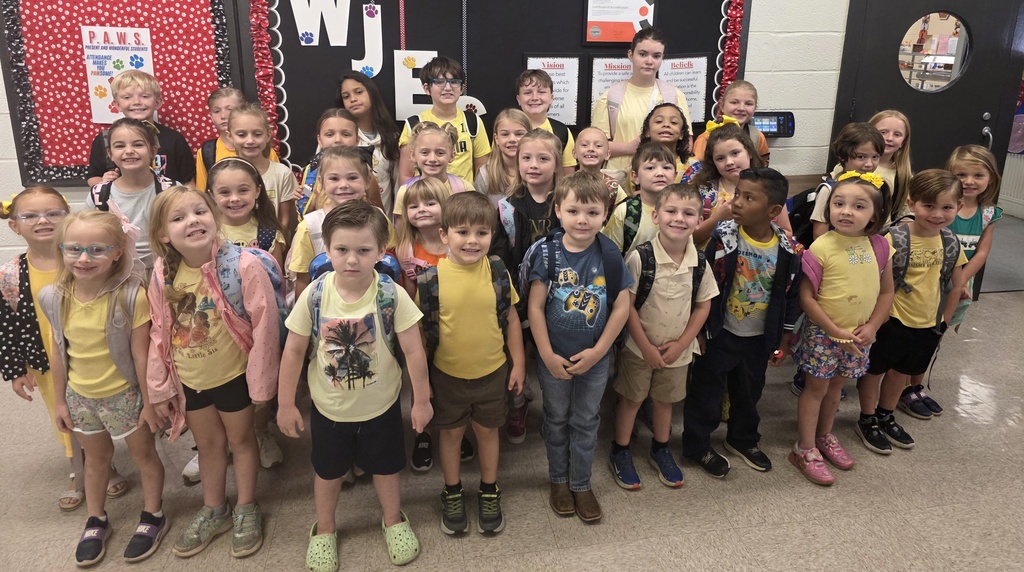 group of students wearing yellow or gold