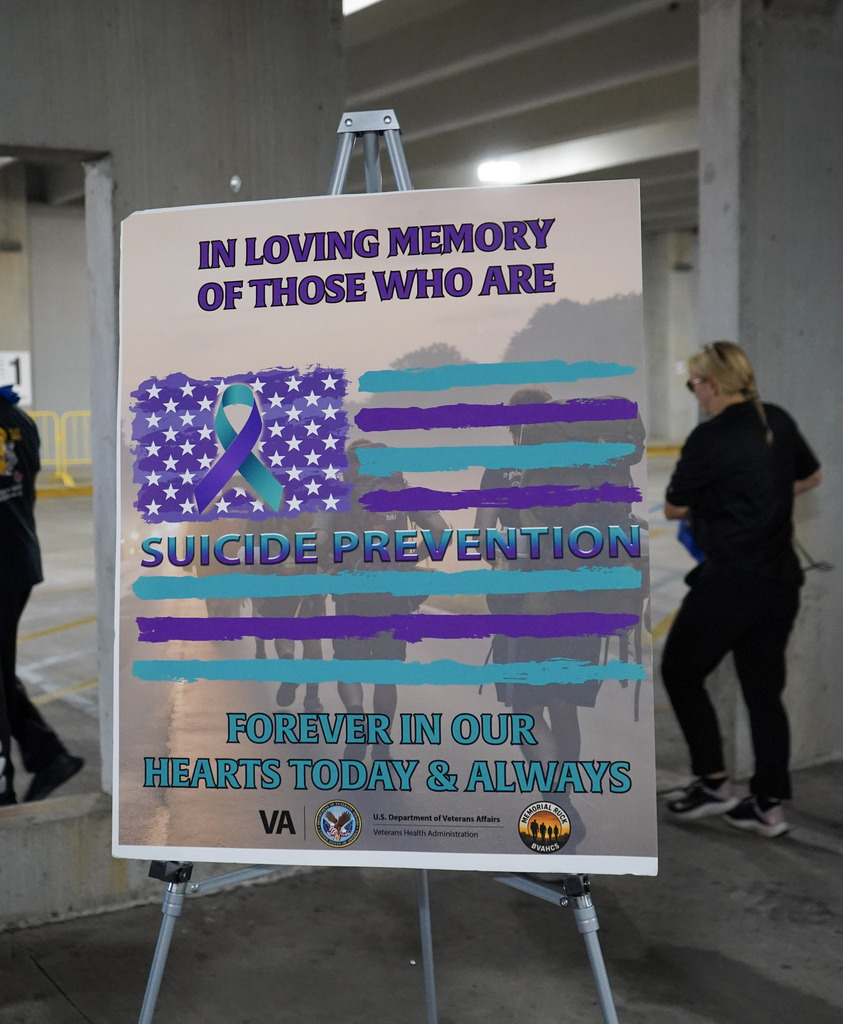 A sign pays tribute to veterans lost to suicide.
