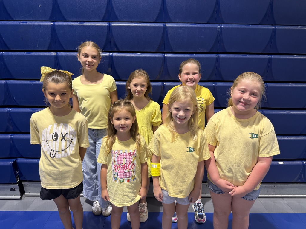 students dressed up wearing yellow for Give Hope Day