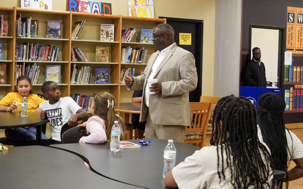 JEFCOED Superintendent Dr. Walter Gonsoulin speaks to a library of students.