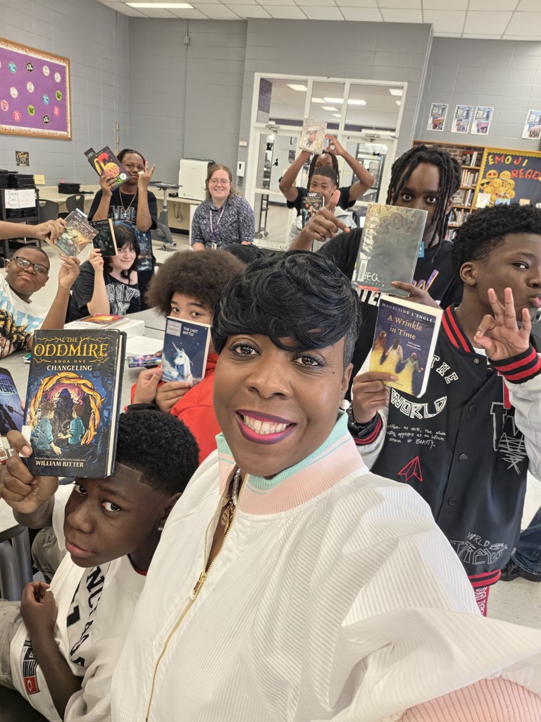 Students enjoyed checking out new books in the library.