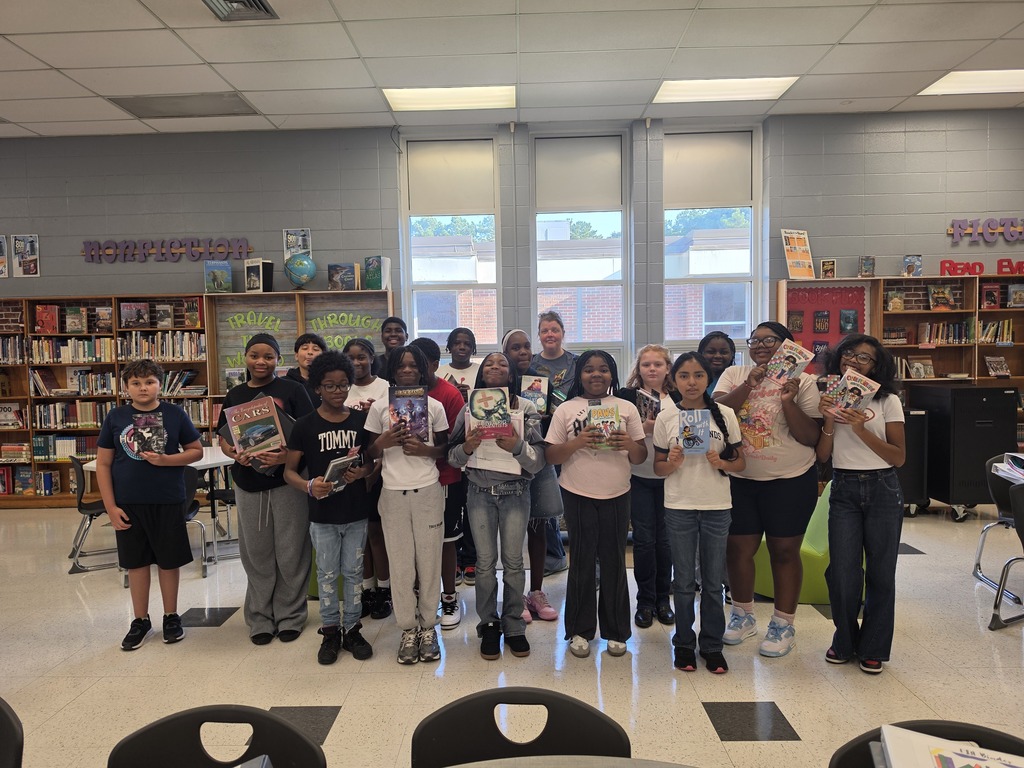 Mrs. G's class enjoy a day in the library.