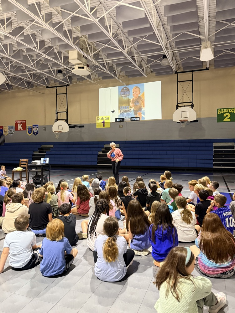 Coach Recke speaking to students 