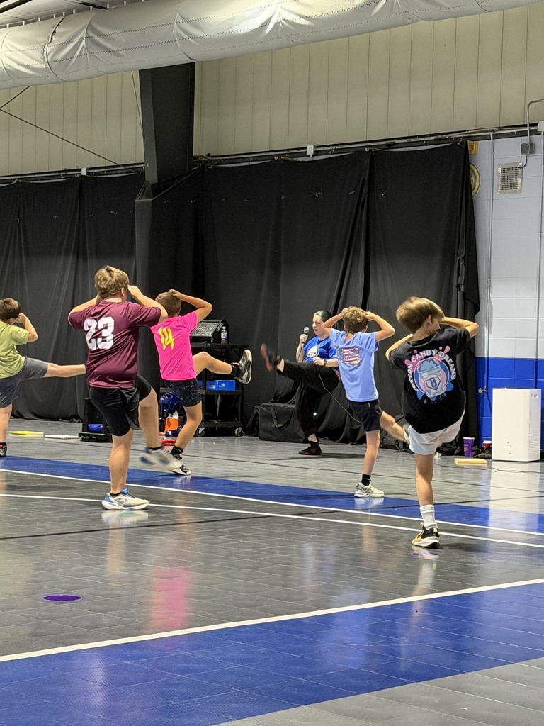 students engaged in martial arts in PE class