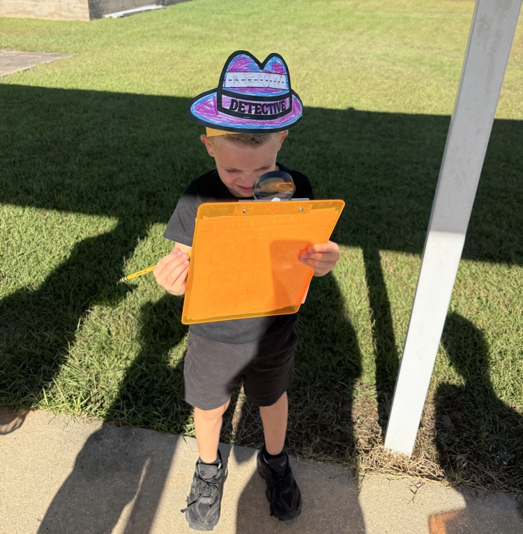 a kindergarten student doing detective work