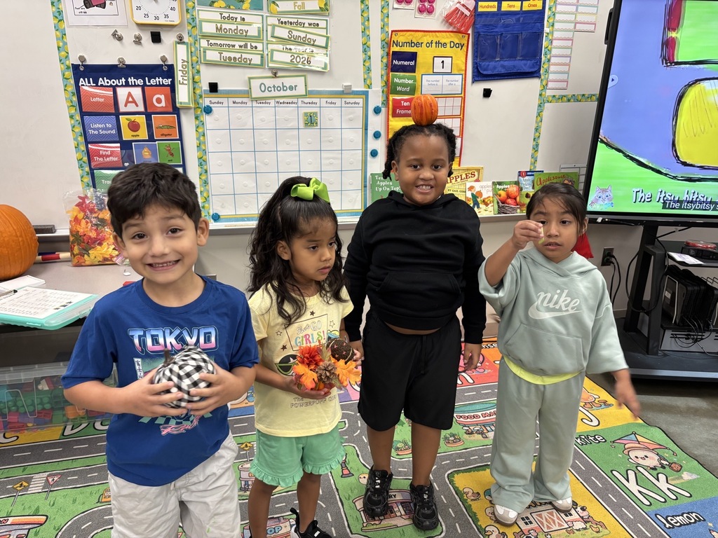 Group photo of Mrs. Hill and Mrs. Clark's classes smiling together and being recognized for their positive behavior, leadership, and hard work at school.