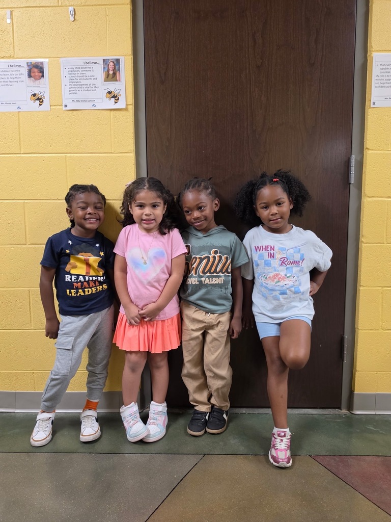 Group photo of the Pre-K Students of the Month smiling together and being recognized for their positive behavior, leadership, and hard work at school.