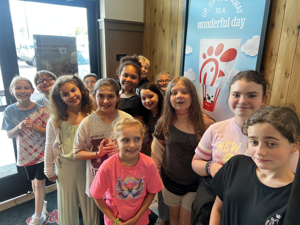 students standing in Chick-Fil-A