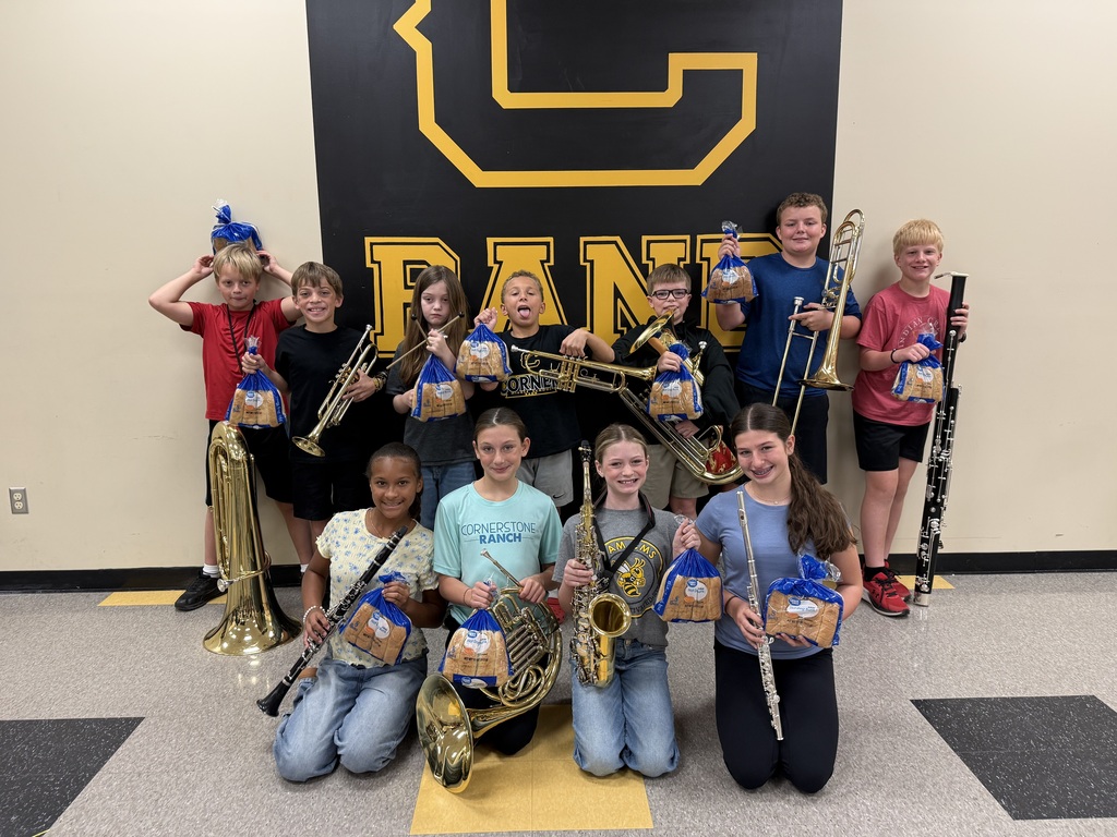 band students holding instruments