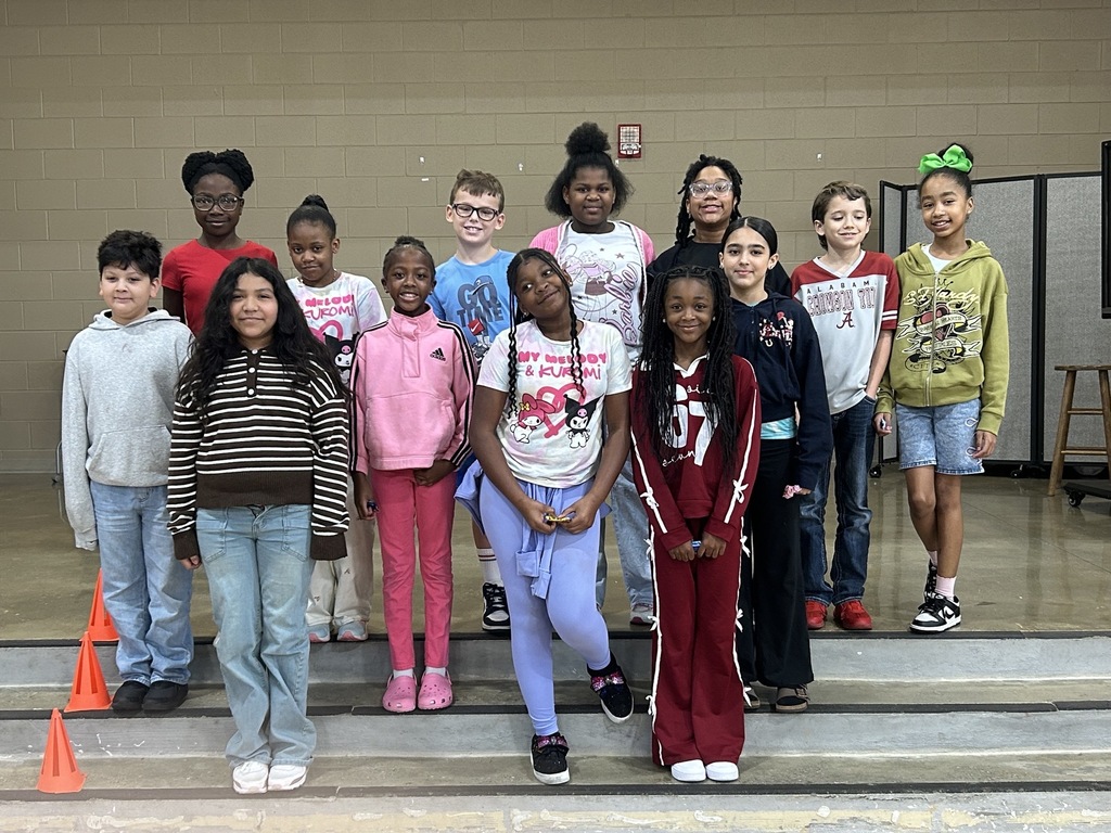 Group photo of McCalla Elementary fifth-grade students being celebrated for meeting their mCLASS and i-Ready benchmark goals.