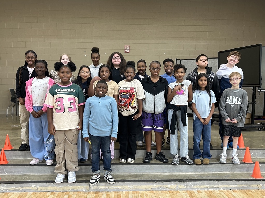 Group photo of McCalla Elementary fifth-grade students being celebrated for meeting their mCLASS and i-Ready benchmark goals.