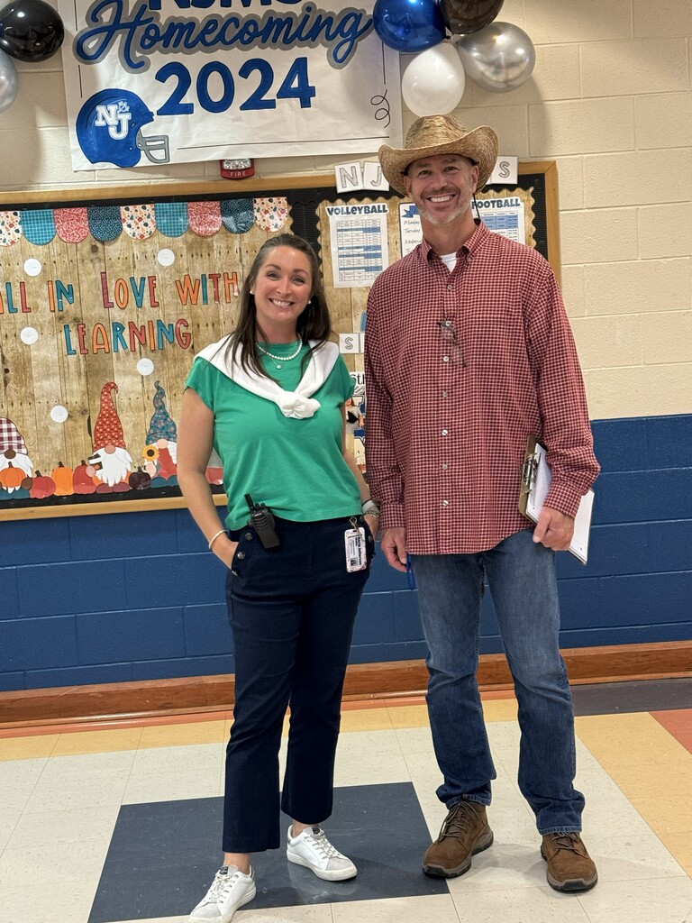 Assistant principal Whitney Stewart and Principal Terry Henderson dressed up for Homecoming