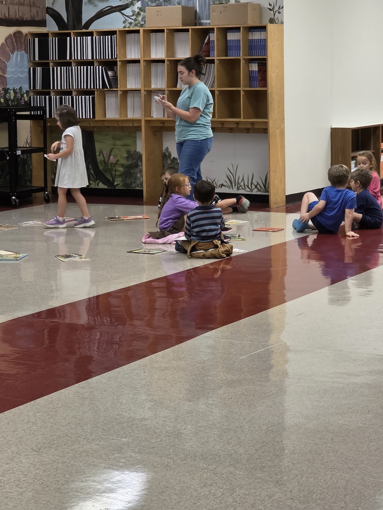 students playing a book walk game
