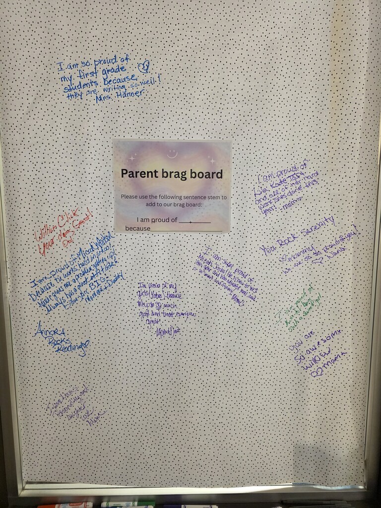 picture of a poster that says "Parent brag board" where parents wrote statements to brag about their child or children,