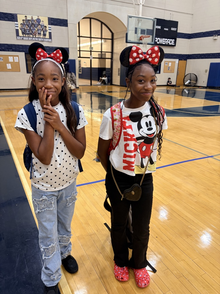 girls wearing Mickey Mouse