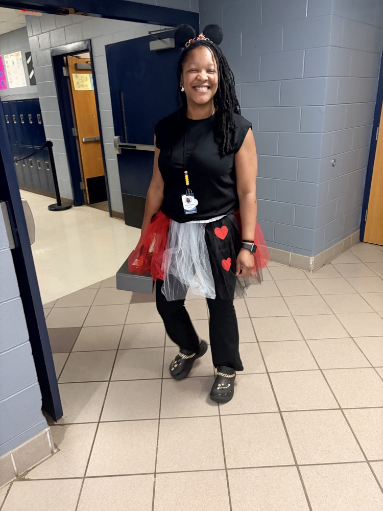 Lady wearing black shirt and skirt with hearts