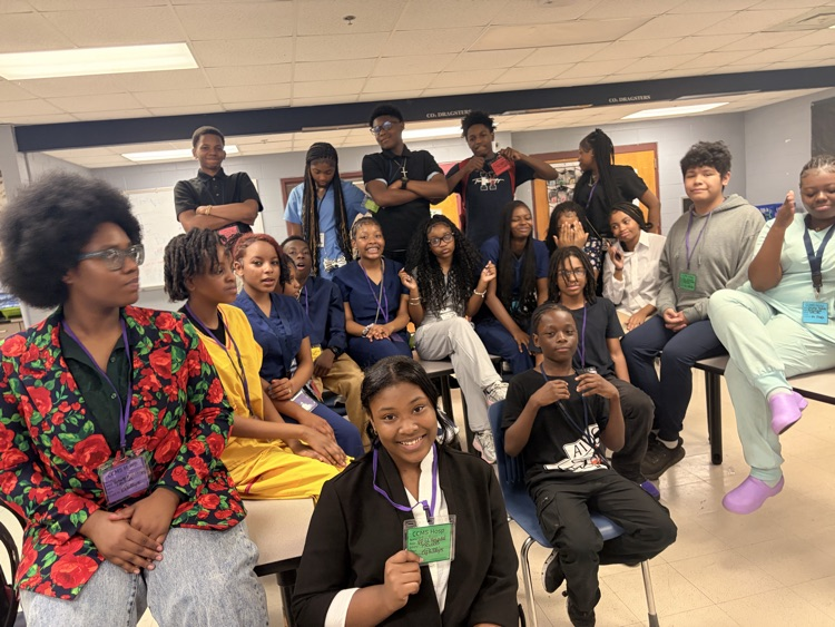 students sitting and taking pic