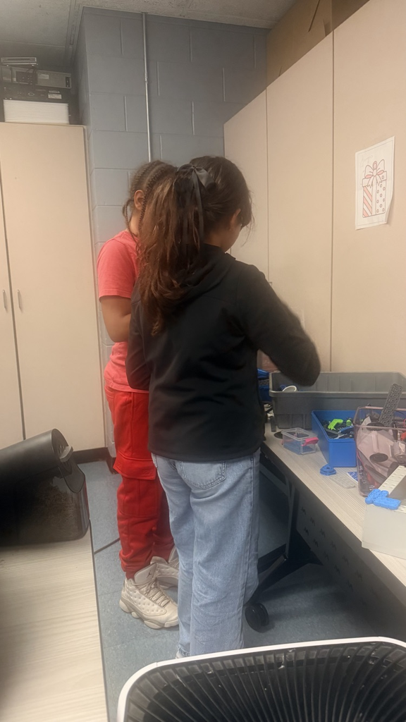 students working on machines