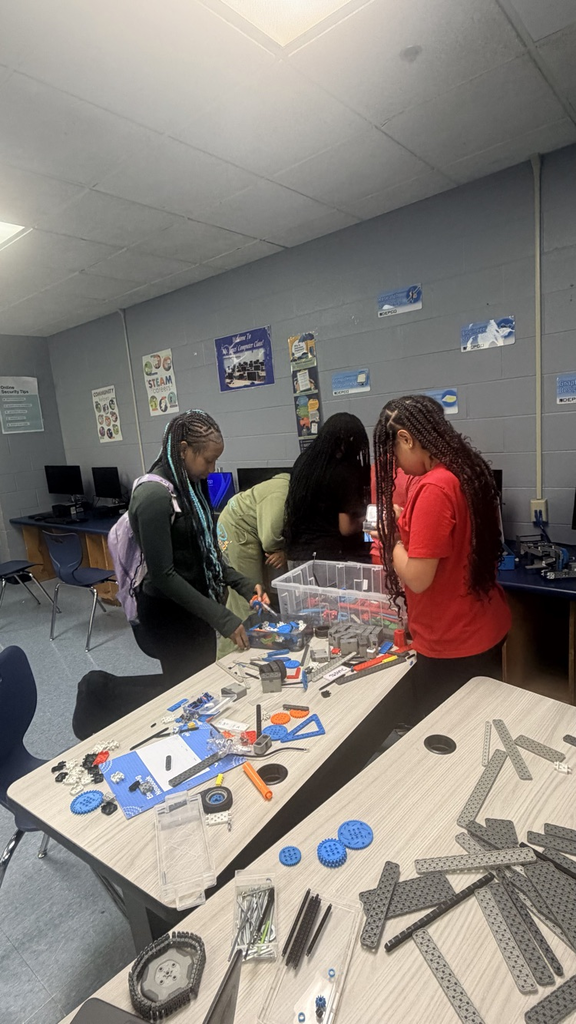 students working together on robots