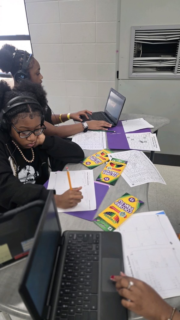 Students working on fractions and decimals.