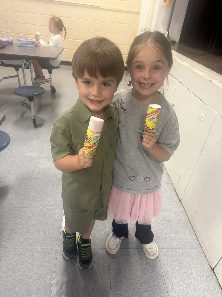 two kids holding ice cream