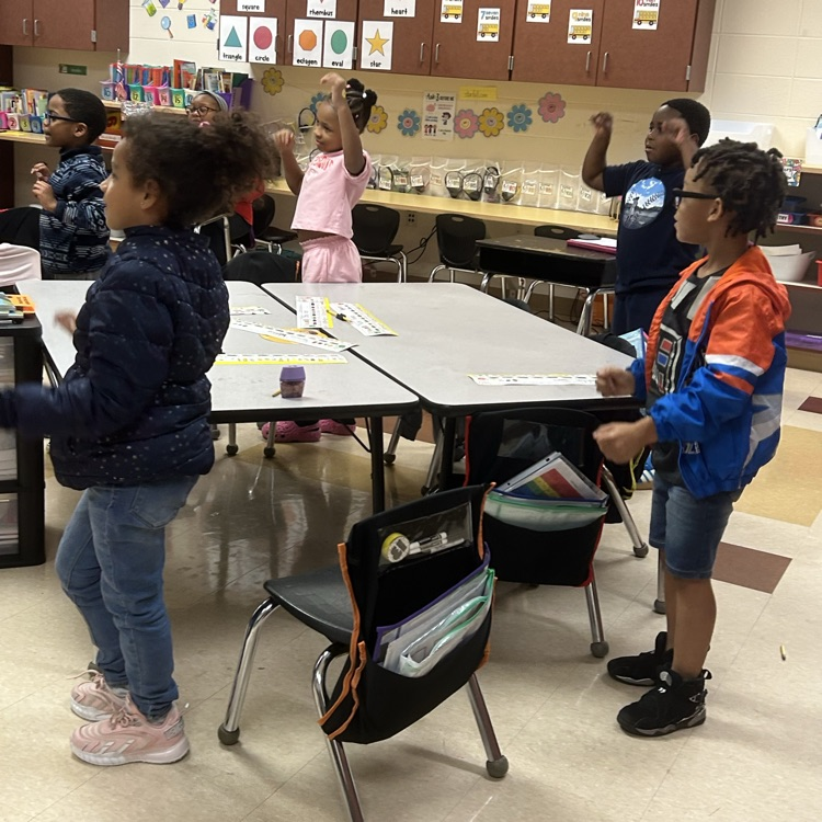 students up dancing to music in a classroom