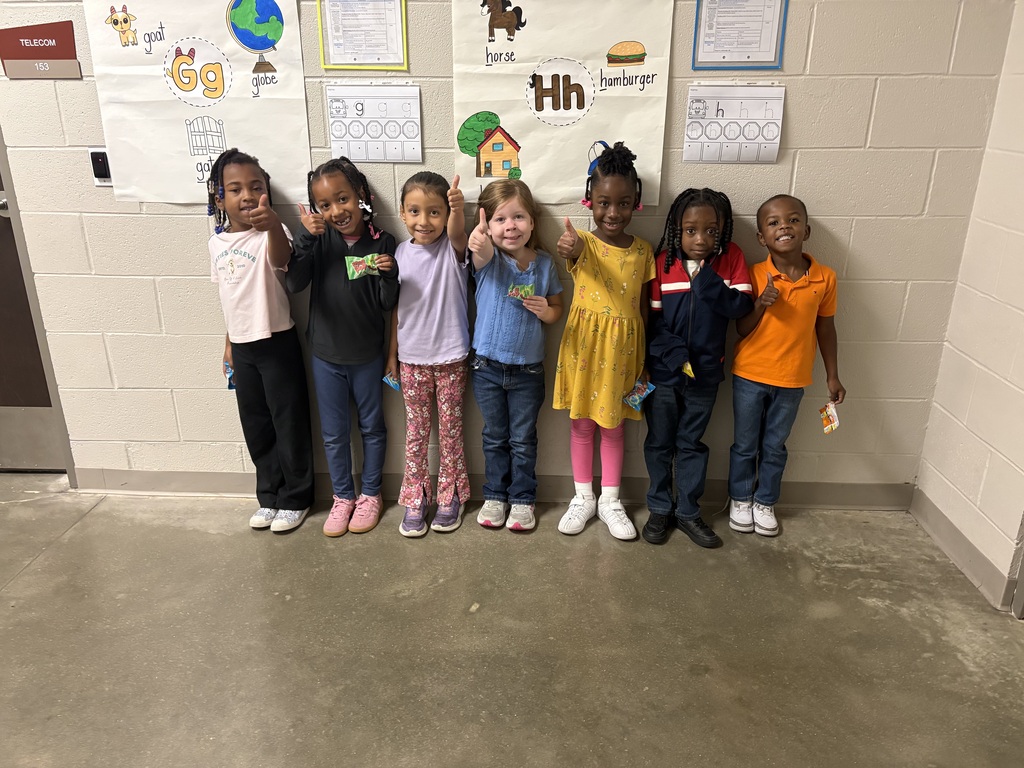 Group photo of McCalla Elementary kindergarten students being recognized for meeting their mCLASS and i-Ready benchmark goals.