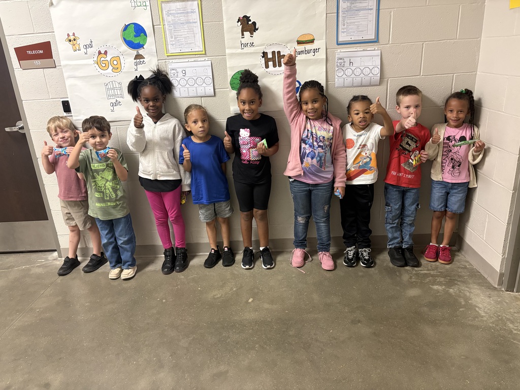 Group photo of McCalla Elementary kindergarten students being recognized for meeting their mCLASS and i-Ready benchmark goals.