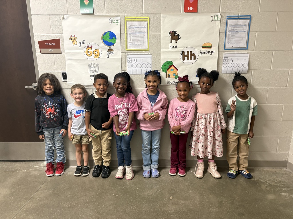 Group photo of McCalla Elementary kindergarten students being recognized for meeting their mCLASS and i-Ready benchmark goals.