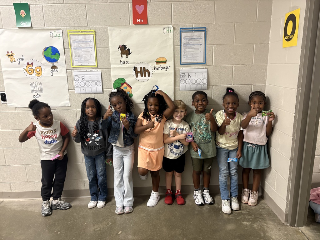 Group photo of McCalla Elementary kindergarten students being recognized for meeting their mCLASS and i-Ready benchmark goals.