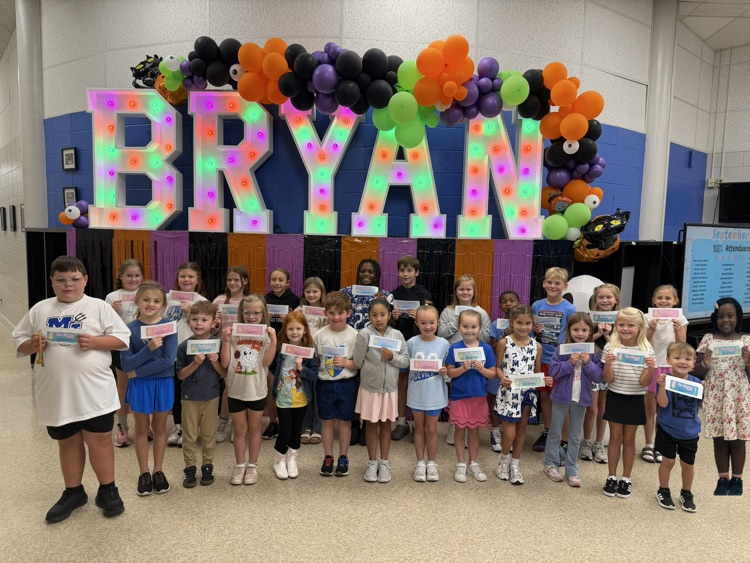 smiling students with free ice cream certificates 