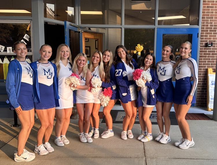 cheerleaders and dancers posing together 