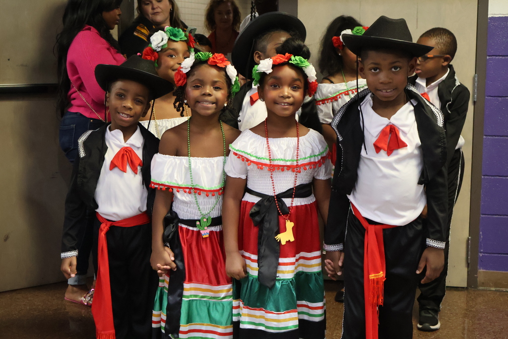 4 students ready to perform at the Hispanic Heritage Month Celebration