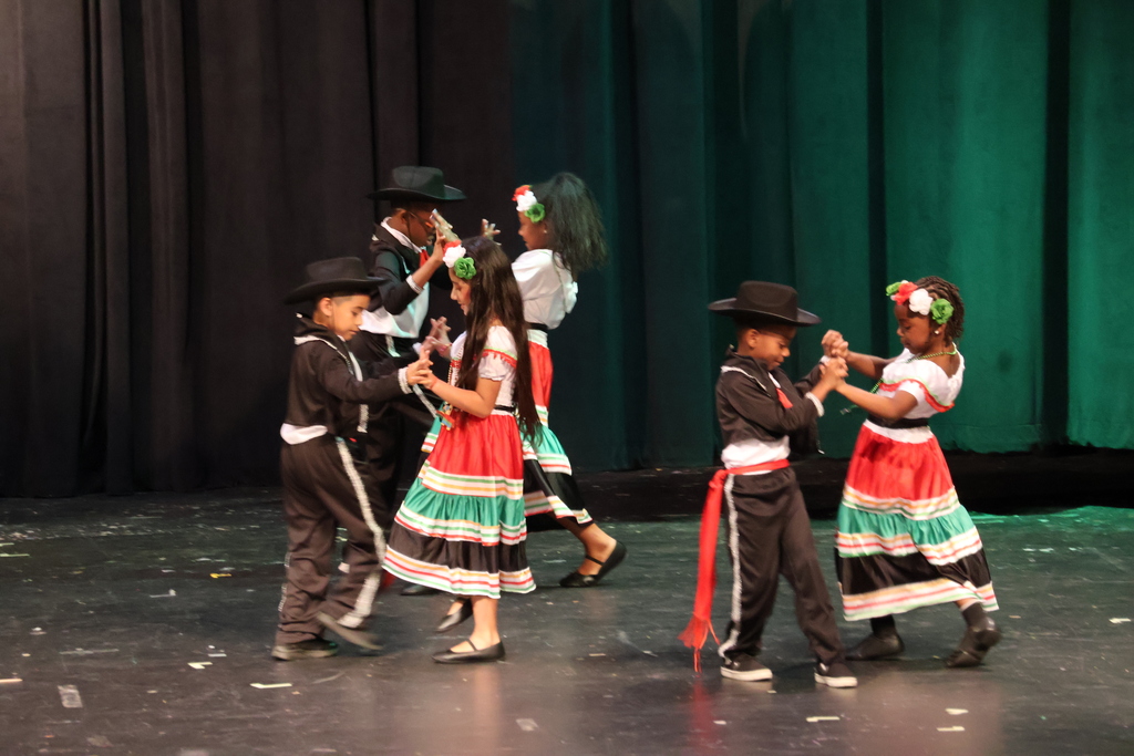 Students performing that the Hispanic Heritage Month celebration at Minor High School