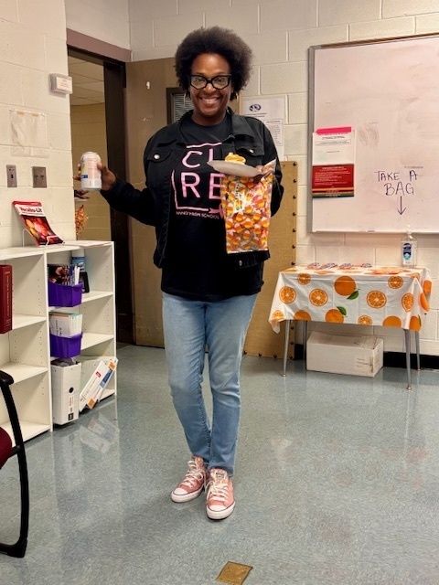 teacher smiling with snacks