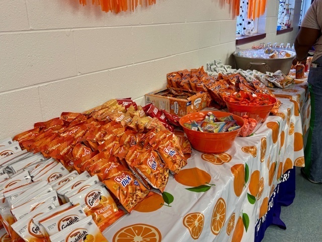 snacks wrapped in orange packinging on a table