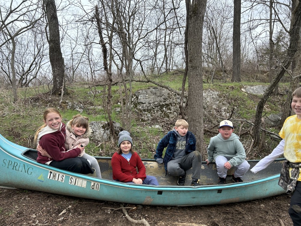 students in canoe