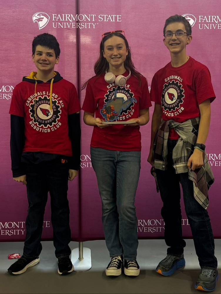 SMS Robotics Team holding the Create Trophy