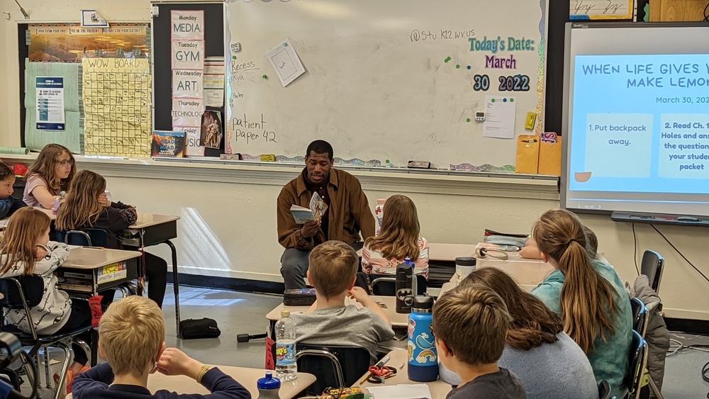 Richard Johnson reading to class