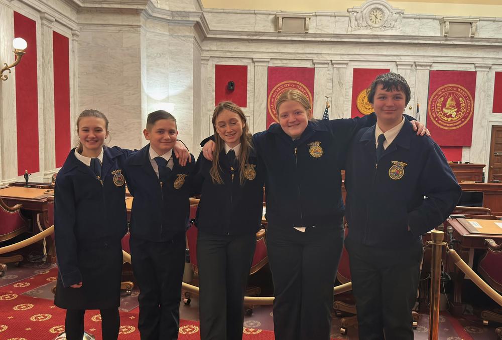 Five FFA Members inside the state capitol